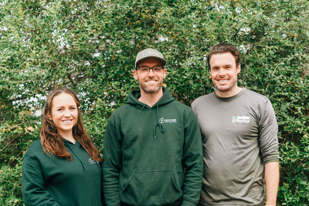 Adam's Apple Tree Service team members at Austin TX job site